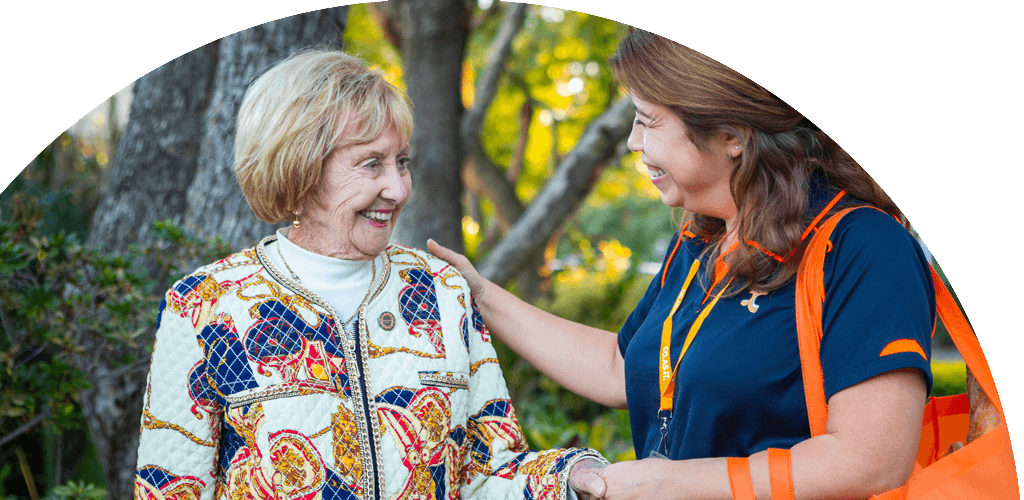 Image shows elder client with care worker - Co.As.It Community Services Home Support & NDIS